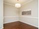 Bright dining room with hardwood floors and chandelier at 222 Kylemore Cir, Cary, NC 27513