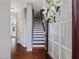Bright and airy entryway with hardwood floors and staircase at 222 Kylemore Cir, Cary, NC 27513