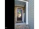 Welcoming front entrance with brick steps and a wreath at 222 Kylemore Cir, Cary, NC 27513