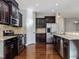 Spacious kitchen with stainless steel appliances and granite countertops at 222 Kylemore Cir, Cary, NC 27513