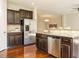 Updated kitchen with stainless steel appliances and granite countertops at 222 Kylemore Cir, Cary, NC 27513