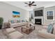 Spacious living room with fireplace and neutral decor at 222 Kylemore Cir, Cary, NC 27513