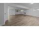 Spacious finished basement with LVP flooring, fireplace, and ample storage at 2421 New Bern Ave, Raleigh, NC 27610