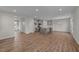 Modern kitchen featuring a large island and gray cabinetry at 26 Wildflower Cir, Clayton, NC 27520