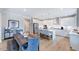 Open floor plan with modern kitchen and adjacent dining area at 2613 Stonington Dr, Cary, NC 27523