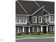 Charming townhome exteriors feature varied siding, black roofs, and manicured landscaping at 3021 White Rail Dr, Fuquay Varina, NC 27526