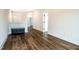 Bright hallway with hardwood floors and built in bench at 306 Quarter Gate Trce, Chapel Hill, NC 27516