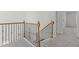 Staircase with metal railing leading to upper level at 3200 Retama, New Hill, NC 27562