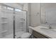 Clean bathroom with walk-in shower, toilet and a vanity with sink at 34 Windflower Ct, Clayton, NC 27520