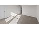 Spacious bedroom with neutral walls and carpet at 34 Windflower Ct, Clayton, NC 27520