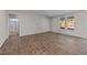 Spacious bedroom with hardwood floors and window view at 34 Windflower Ct, Clayton, NC 27520