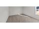 Well-lit bedroom with neutral walls and carpet at 34 Windflower Ct, Clayton, NC 27520