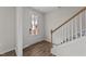 Bright foyer with hardwood floors and staircase at 34 Windflower Ct, Clayton, NC 27520