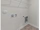 Laundry area with shelving and built-in storage at 34 Windflower Ct, Clayton, NC 27520