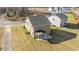 Aerial view of two-story house with covered patio and landscaped yard at 36 Railcar Way, Clayton, NC 27520