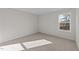 Bright bedroom with carpeted floor and window with natural light at 36 Railcar Way, Clayton, NC 27520