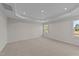 Bright bedroom featuring neutral walls and carpet at 36 Railcar Way, Clayton, NC 27520