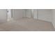 Large bedroom with carpet, and access to multiple rooms at 36 Railcar Way, Clayton, NC 27520