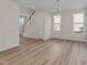 Bright dining room features hardwood floors and an open concept design at 36 Railcar Way, Clayton, NC 27520