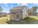 Two-story house with covered patio and landscaped yard at 36 Railcar Way, Clayton, NC 27520