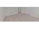 Bedroom view with neutral carpeting and closet at 36 Railcar Way # Homesite 1, Clayton, NC 27520