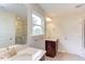 Double vanity bathroom with walk-in shower at 37 Baird Cv Ln, Angier, NC 27501