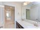 Double vanity bathroom with a view to hallway at 37 Baird Cv Ln, Angier, NC 27501