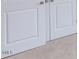 Well-lit closet with double doors and neutral colors at 37 Baird Cv Ln, Angier, NC 27501