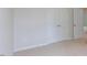 Bright bedroom with double doors and neutral colors at 37 Baird Cv Ln, Angier, NC 27501