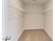 Large walk-in closet with wire shelving at 37 Baird Cv Ln, Angier, NC 27501