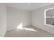 Bedroom filled with natural light, featuring neutral walls and carpet, perfect for relaxation and personalization at 48 Railcar Way # Homesite 2, Clayton, NC 27520