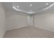 Well-lit bedroom with access to hallway at 48 Railcar Way, Clayton, NC 27520