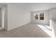 Spacious bonus room with two windows and carpet at 48 Railcar Way, Clayton, NC 27520
