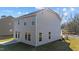 Rear view of a two story house with gray siding at 48 Railcar Way, Clayton, NC 27520