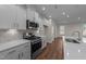 Contemporary kitchen featuring stainless steel appliances, custom cabinetry, and ample counter space at 48 Railcar Way # Homesite 2, Clayton, NC 27520