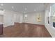 Spacious living room with hardwood floors and large windows at 48 Railcar Way, Clayton, NC 27520