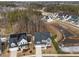 Aerial view of new construction homes in a wooded community at 645 Silvercomet Dr, Knightdale, NC 27545