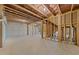 Large unfinished basement with concrete flooring and exposed ceiling at 645 Silvercomet Dr, Knightdale, NC 27545