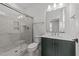 Bathroom featuring large glass shower, toilet, and vanity with a white countertop at 645 Silvercomet Dr, Knightdale, NC 27545