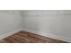 Empty walk-in closet with no shelving and hardwood flooring at 645 Silvercomet Dr, Knightdale, NC 27545