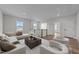 Inviting upstairs living room with plush seating, modern decor, and plenty of space for relaxation at 645 Silvercomet Dr, Knightdale, NC 27545