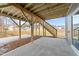 Concrete patio under the deck overlooking the backyard at 645 Silvercomet Dr, Knightdale, NC 27545