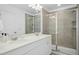 Bathroom with double vanity and walk-in shower at 747 Creekway Dr, Fuquay Varina, NC 27526