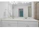 Double vanity bathroom with large mirror and shower at 747 Creekway Dr, Fuquay Varina, NC 27526