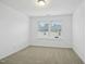 Simple bedroom with neutral walls and carpeted floor at 747 Creekway Dr, Fuquay Varina, NC 27526