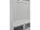 White coat closet with vertical paneling and storage shelves at 747 Creekway Dr, Fuquay Varina, NC 27526
