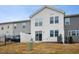 Townhouse rear view, showing a private fenced yard at 747 Creekway Dr, Fuquay Varina, NC 27526