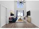 Spacious Gathering room with high ceilings, hardwood floors, and sliding glass doors at 747 Creekway Dr, Fuquay Varina, NC 27526