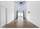 Spacious Gathering room with high ceilings, hardwood floors, and sliding glass doors at 747 Creekway Dr, Fuquay Varina, NC 27526