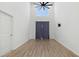 Spacious Gathering room with high ceilings, hardwood floors, and sliding glass doors at 747 Creekway Dr, Fuquay Varina, NC 27526